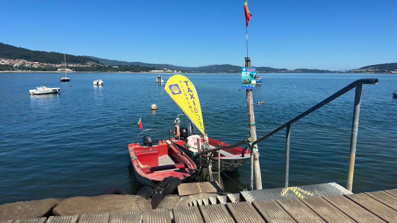 Our taxi boats moored at the pontoon in Caminha, the Minho estuary behind.